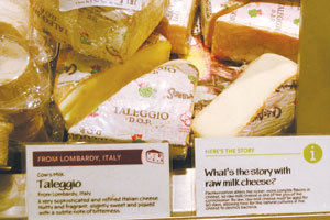 Whole Foods posts raw milk cheese information on the cheese counter.