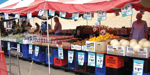 The produce department goes outside for Maxwell Street Days.