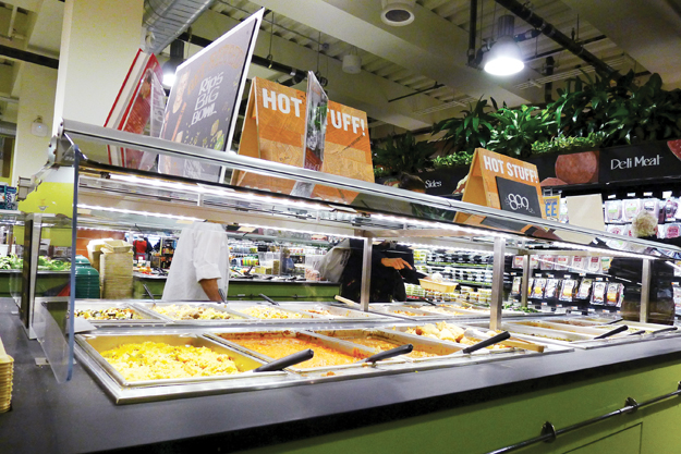 Whole Foods maintains a variety of prepared-food offerings in its smaller locations, although full-service dining is out.