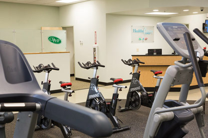 The facility features a group exercise room, fitness equipment, personal lockers and shower facilities.