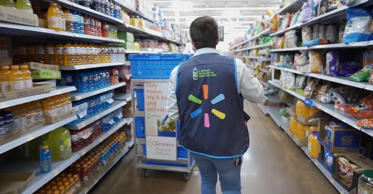 Walmart online grocery worker with cart