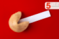 A fortune cookie with a blank fortune on a red background.png