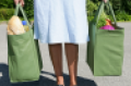 woman-holding-shopping-bags.png